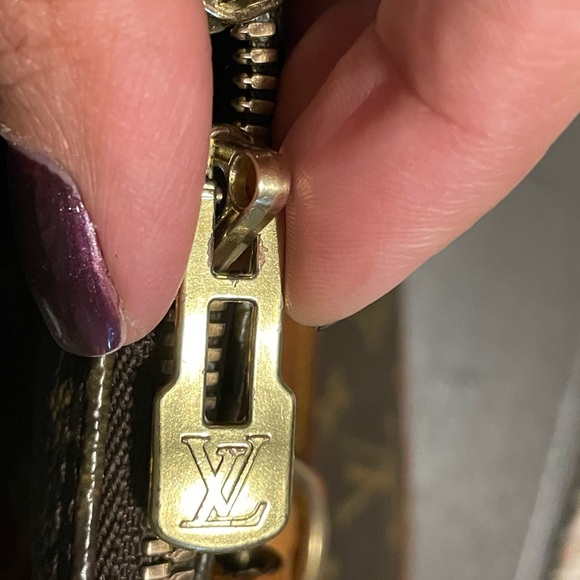 AUTHENTIC Monogram Alma PM Louis Vuitton bag authenticated by Authentic Street. - Picture 12 of 13